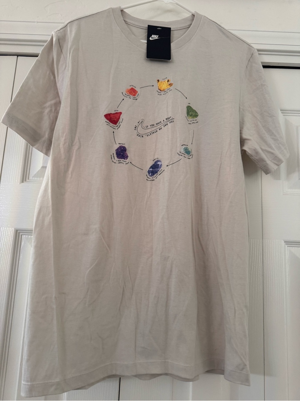 Nike Kids Beige Short Sleeve Tee with Multicolor Pebble Graphic